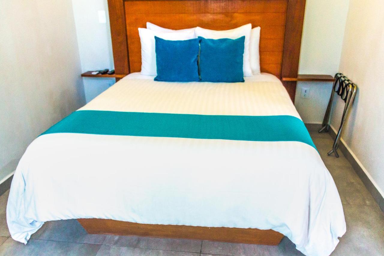Aquastar Hotel & Apartments Mahahual Bagian luar foto