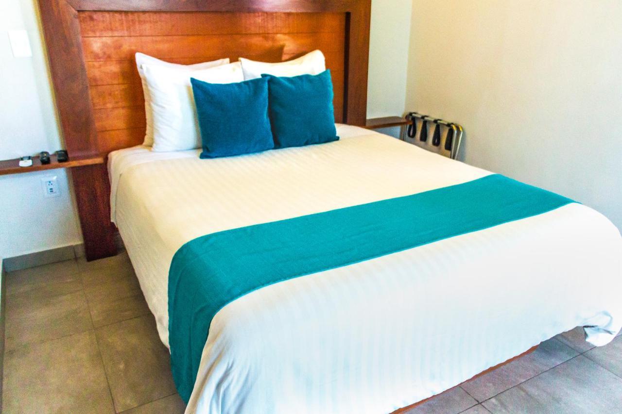 Aquastar Hotel & Apartments Mahahual Bagian luar foto