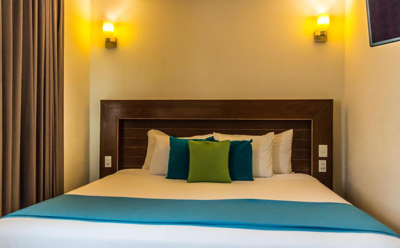 Aquastar Hotel & Apartments Mahahual Bagian luar foto