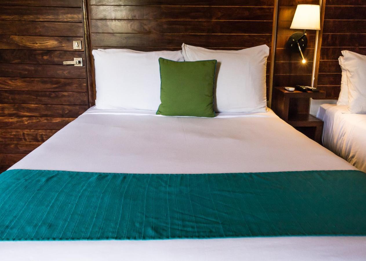 Aquastar Hotel & Apartments Mahahual Bagian luar foto