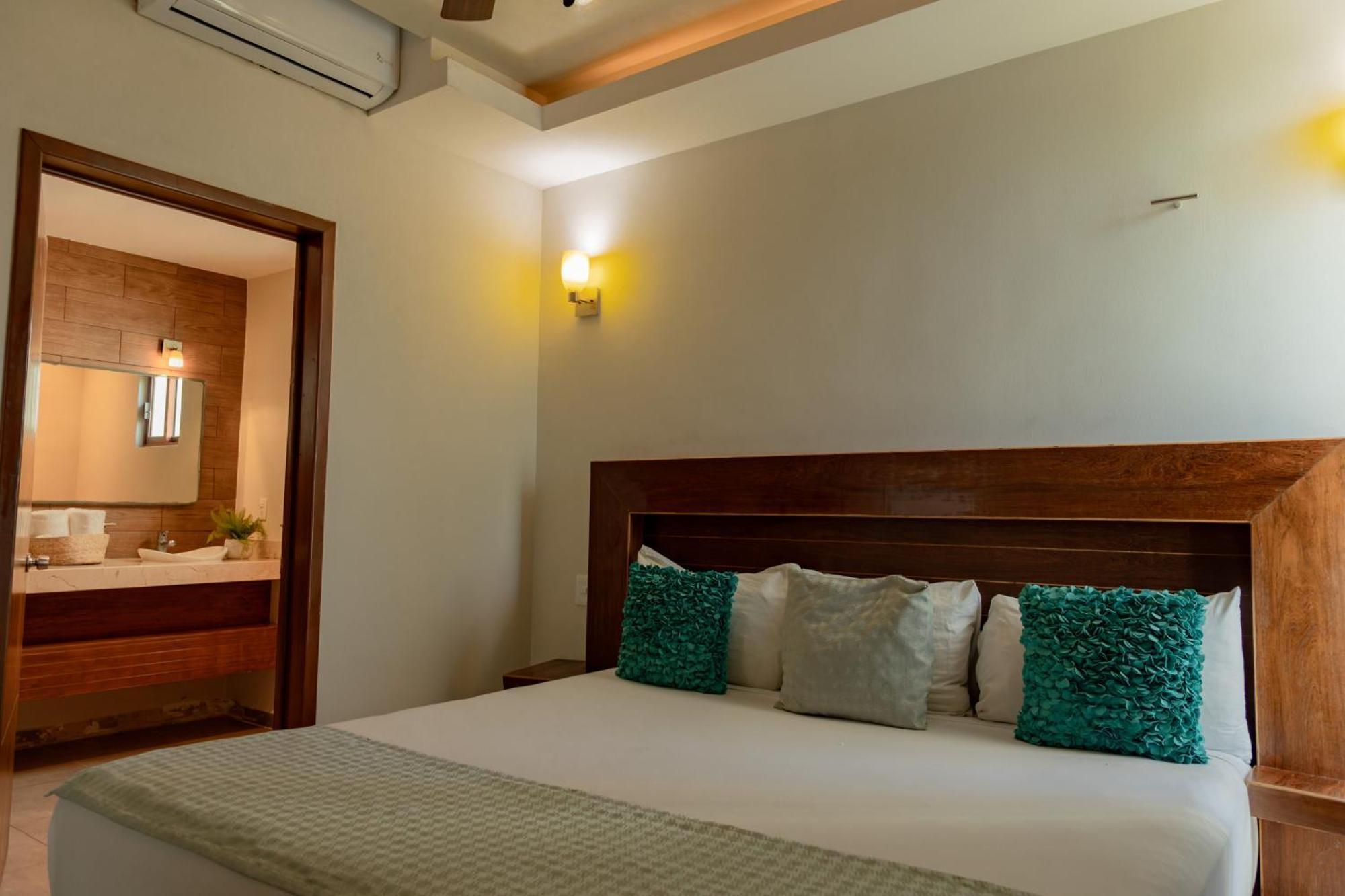 Aquastar Hotel & Apartments Mahahual Bagian luar foto