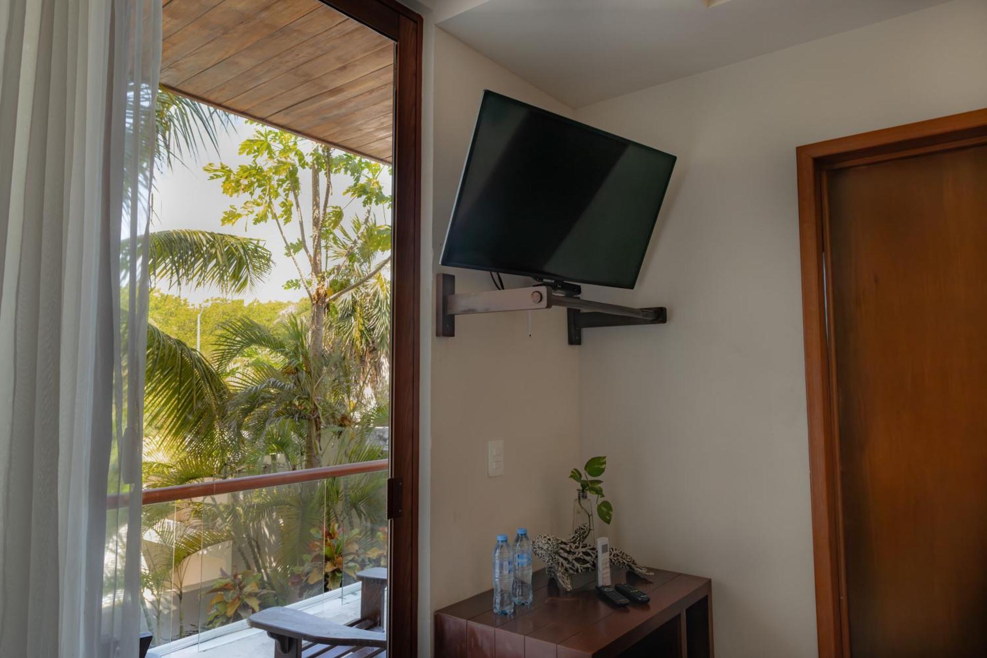 Aquastar Hotel & Apartments Mahahual Bagian luar foto