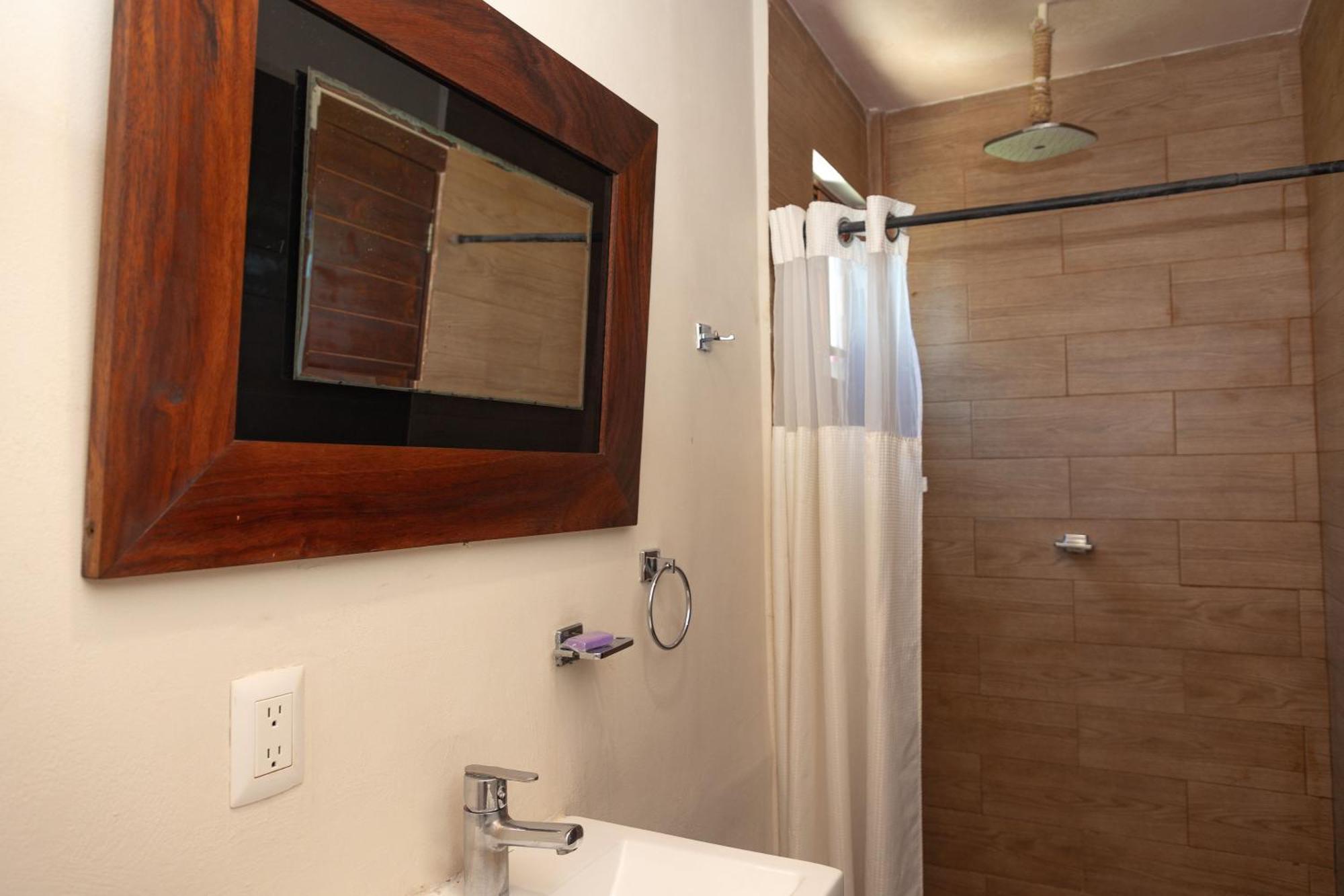Aquastar Hotel & Apartments Mahahual Bagian luar foto