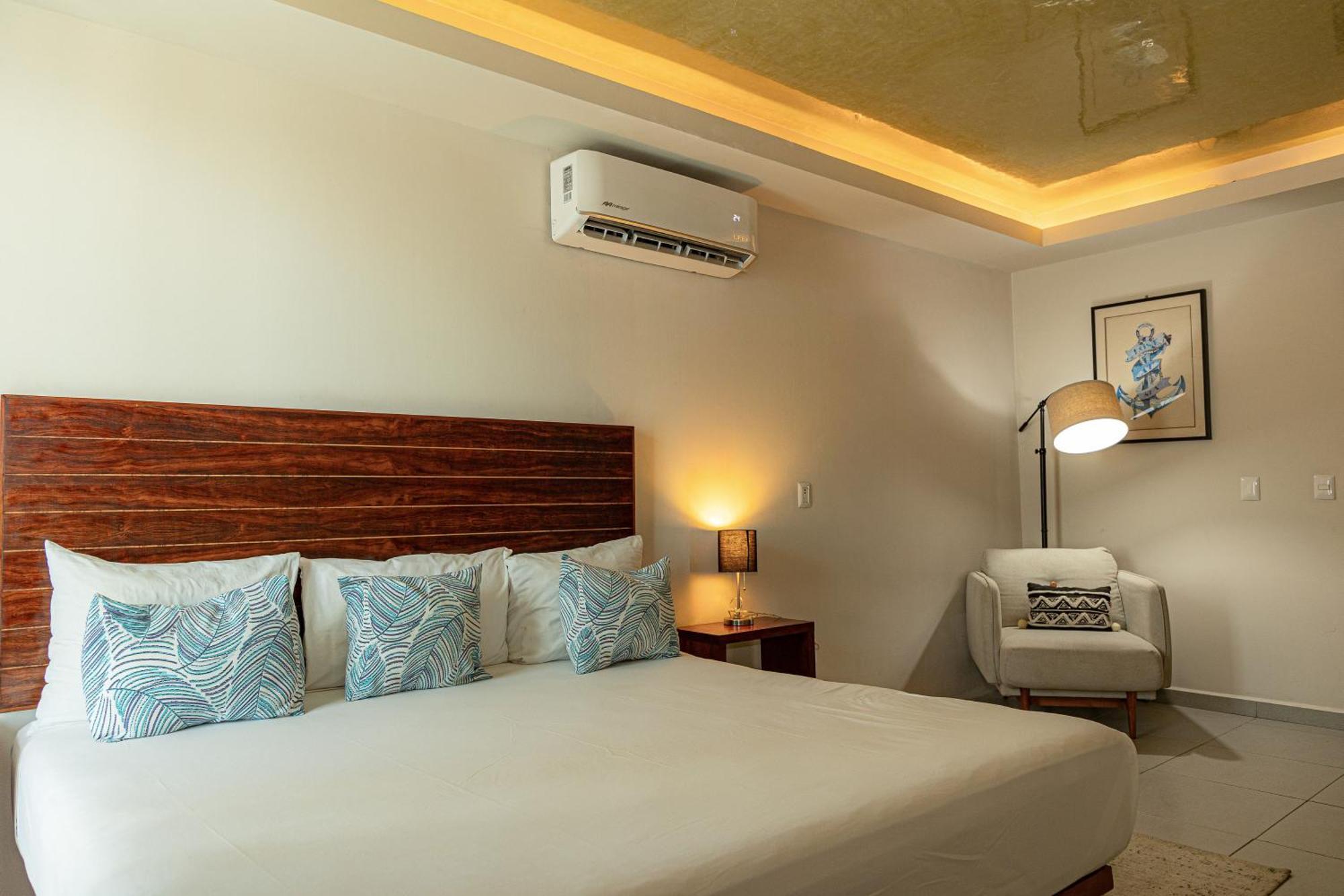 Aquastar Hotel & Apartments Mahahual Bagian luar foto