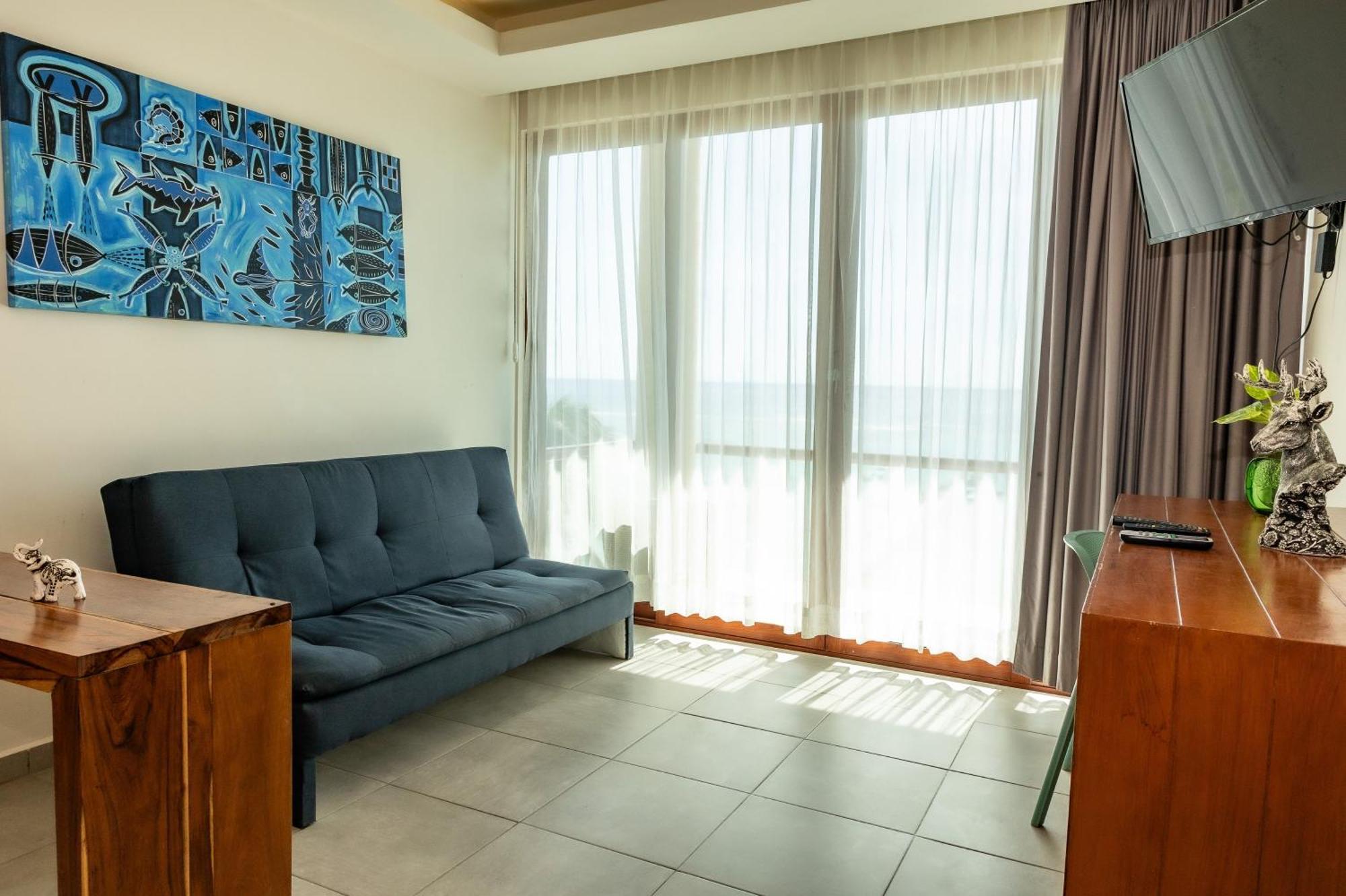 Aquastar Hotel & Apartments Mahahual Bagian luar foto