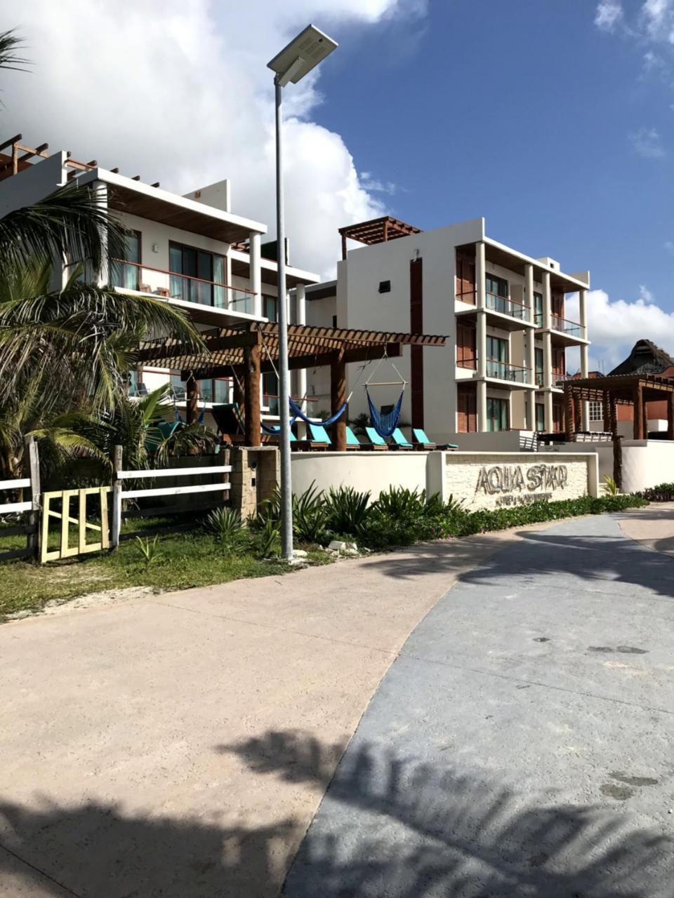 Aquastar Hotel & Apartments Mahahual Bagian luar foto