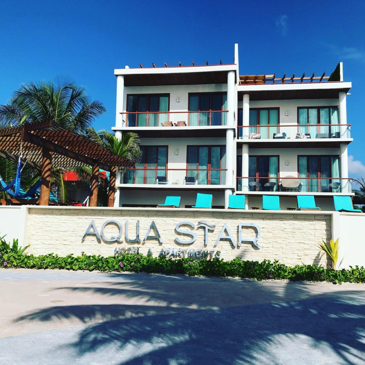Aquastar Hotel & Apartments Mahahual Bagian luar foto